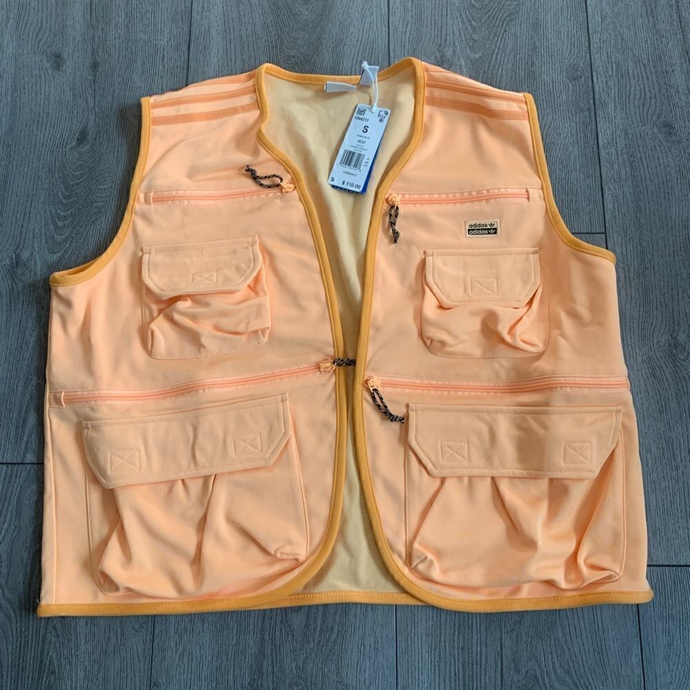 Adidas woman’s vest Jacket color is acid orange